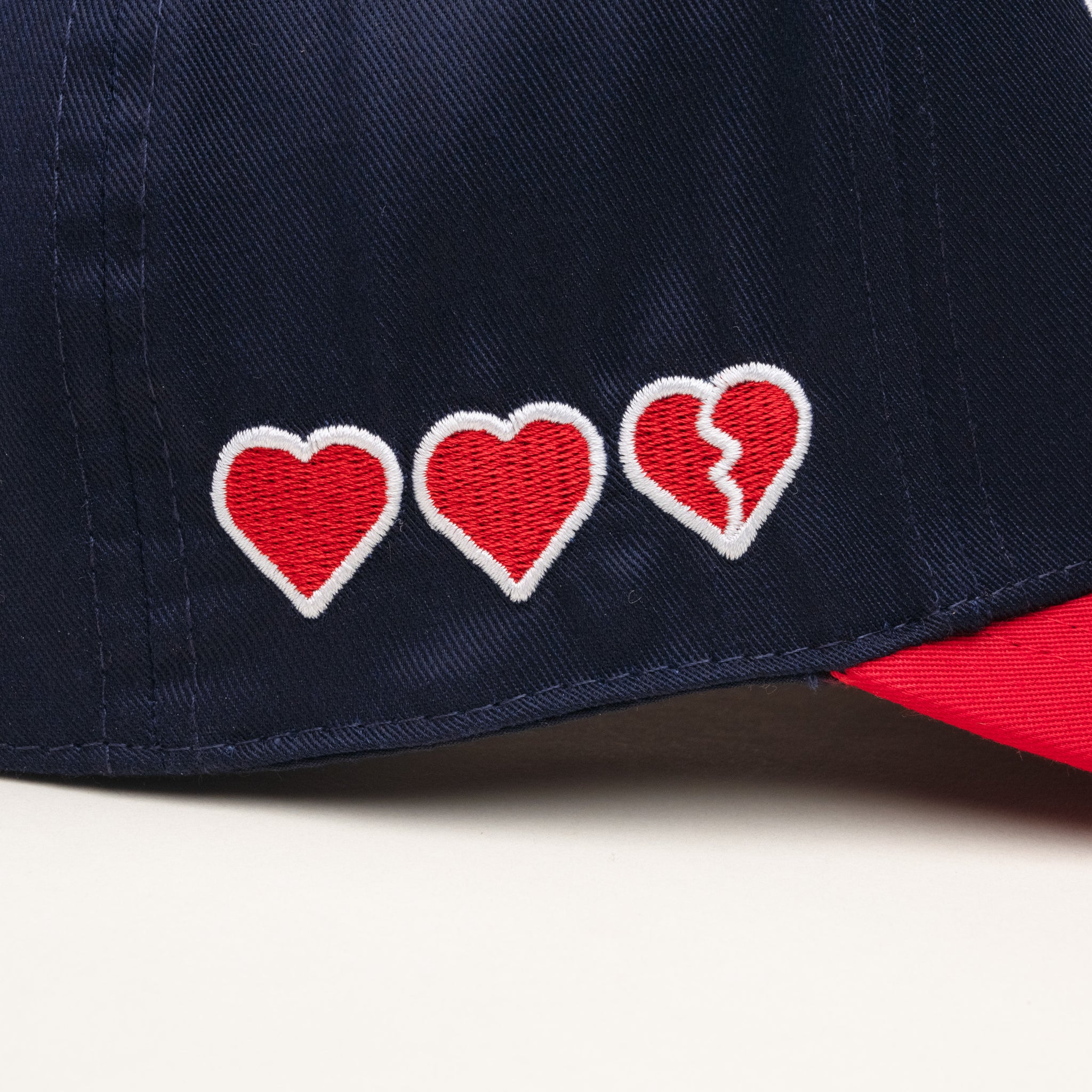 THE CYF HAT RED/NAVY